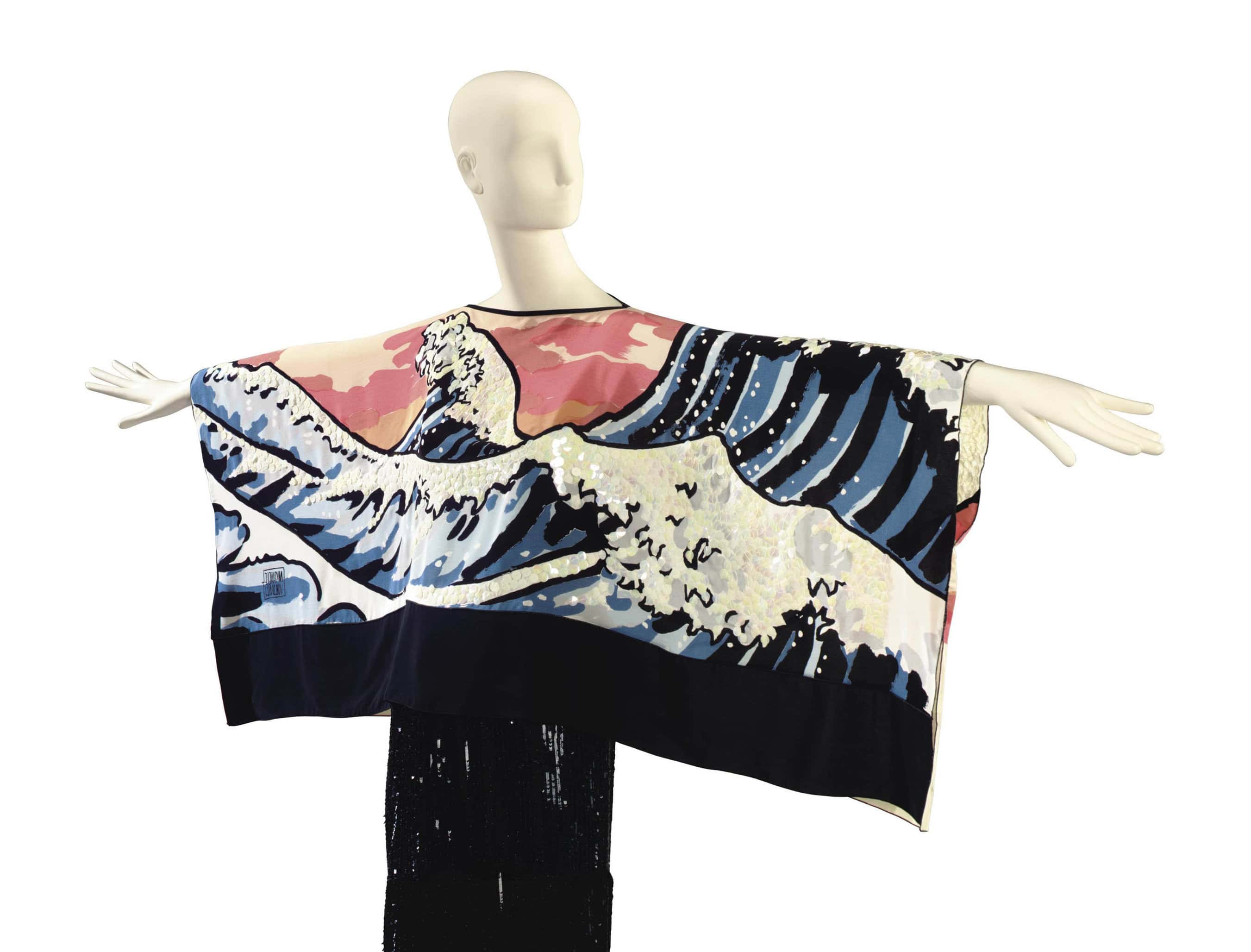 Christies: MICHAEL VOLLBRACHT PEACH GROUND MULTI-COLOR DYED SILK AND SEQUINNED SHORT BLOUSE LABELED 'MICHAEL VOLLBRACHT' AND SIGNED IN FABRIC, PROBABLY EARLY 1980S of 'sky and wave' motif print, with a boat-neck, slit armholes for short full draped sleeves and crop cut