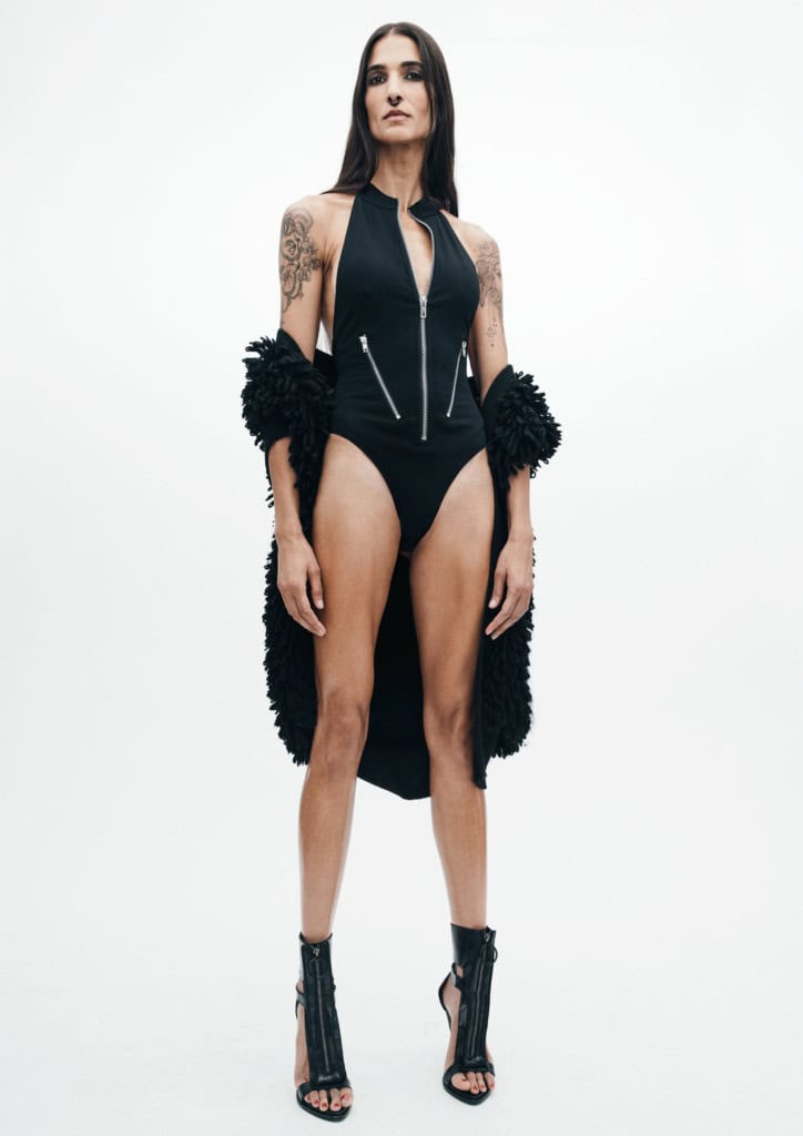 Sweater vest: Stella Mccartney
Bodysuit: I.AM.GIA
Show: Givenchy
Septum ring: Auri