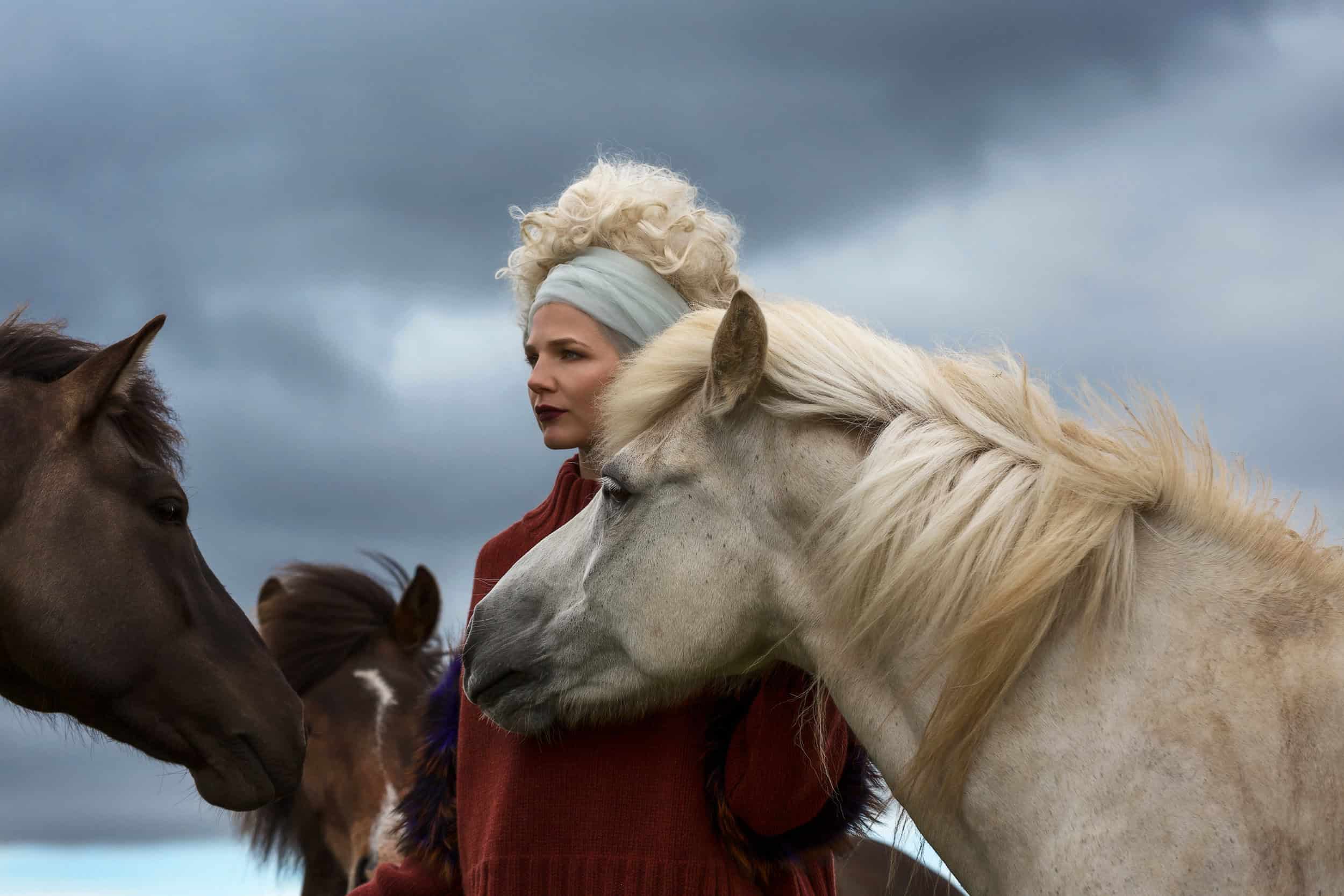 Garment: Sally LaPoint with horses