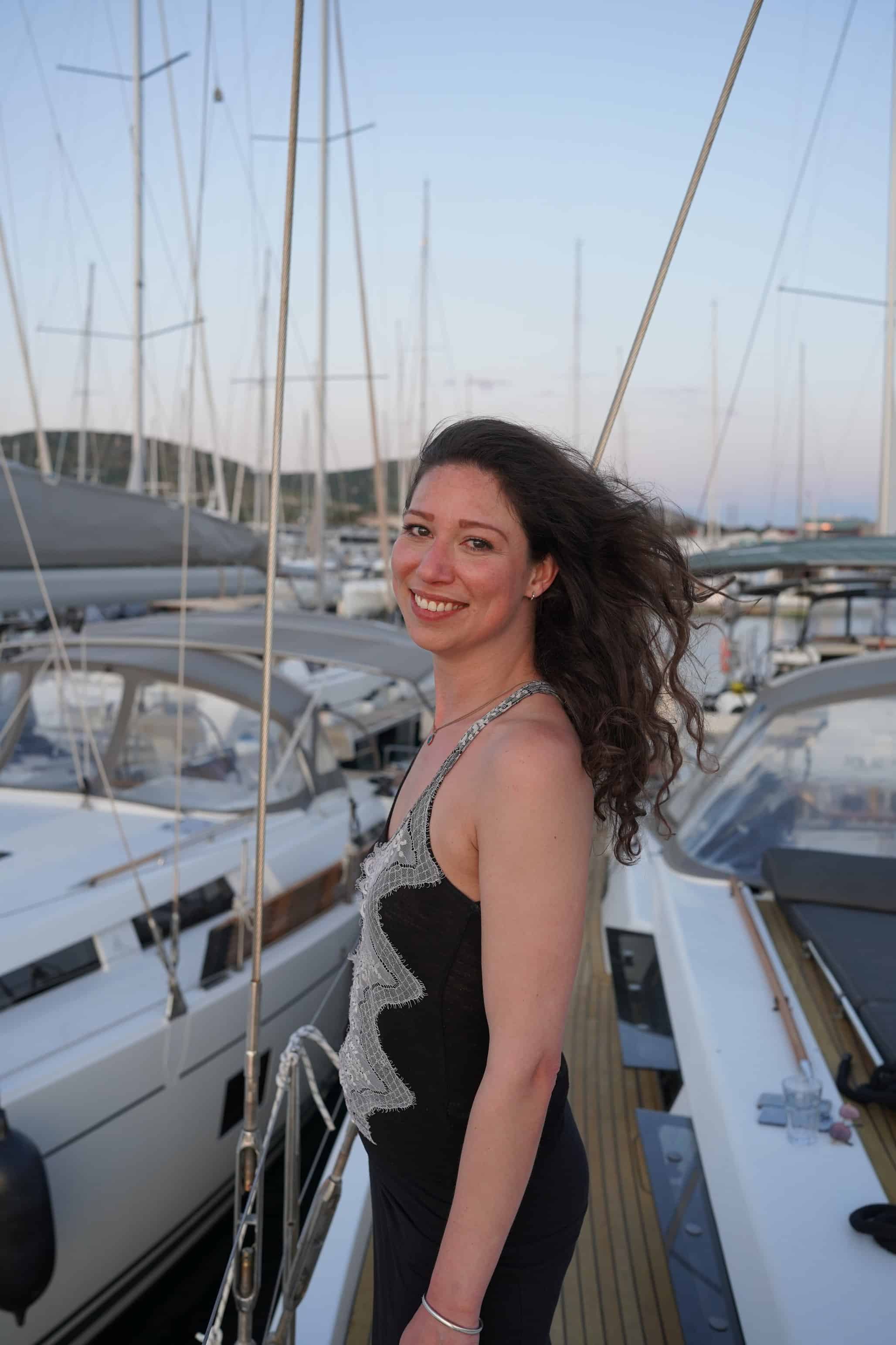 color portrait photograph of person on sailboat