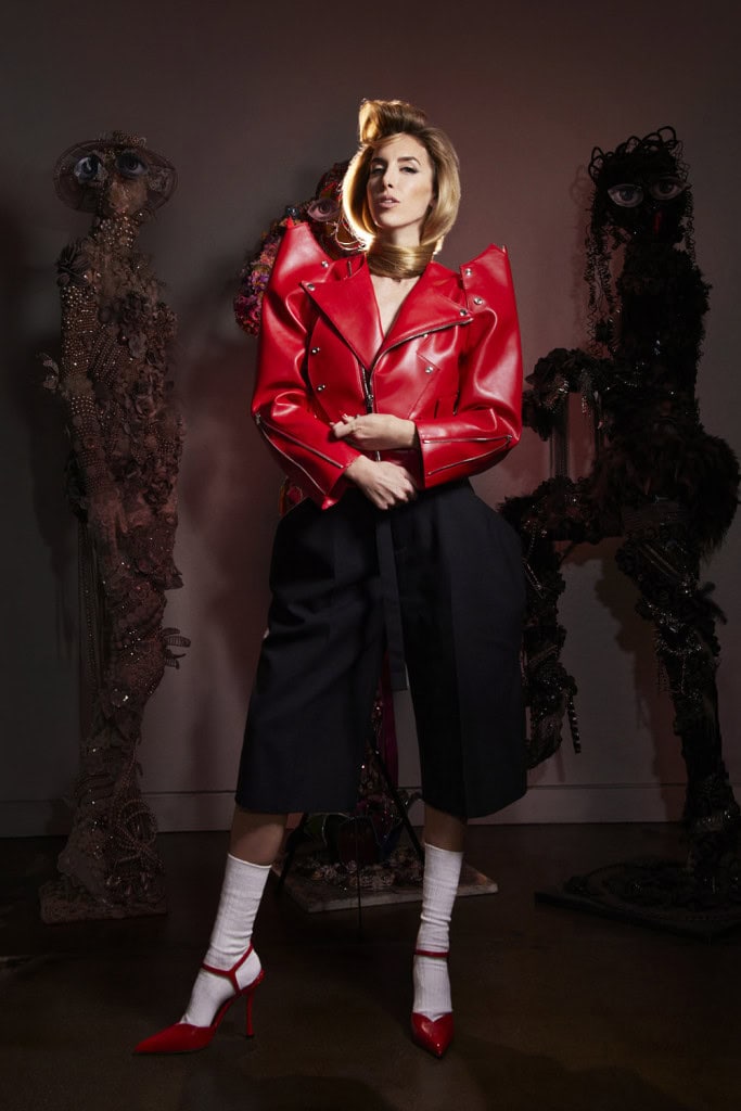 MISS VELVET dressed in Red jacket Noir Kei Ninomiya, Shorts Sacai, Shoe Ferragamo